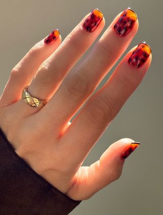 Betina Goldstein's tortoiseshell nails