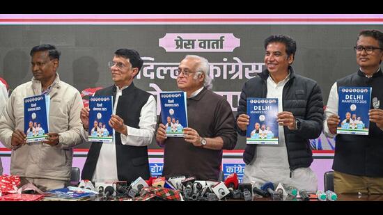 Congress leaders Jairam Ramesh, Pawan Khera, Udit Raj and Devender Yadav at the manifesto launch. (HT PHOTO)