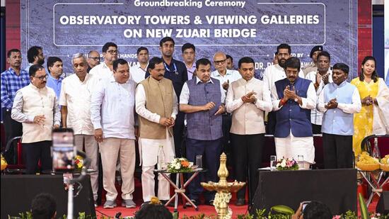 Cortalim: Union minister Nitin Gadkari lays the foundation stone for an observatory tower and viewing galleries atop the New Zuari Bridge in the presence of Goa CM Pramod Sawant and Union minister Shripad Naik (PTI)