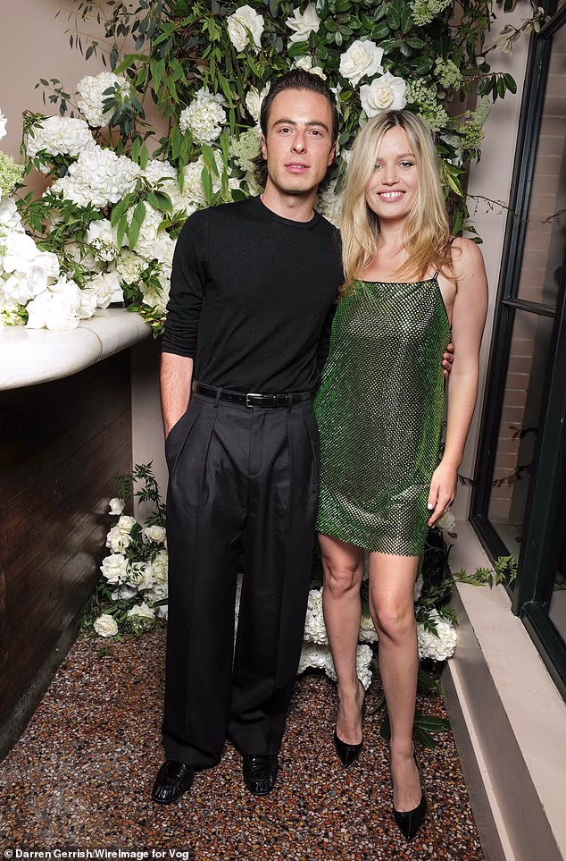 Georgia posed alongside designer Marco Capaldo as he hosted a dinner celebration to mark the launch of his brand 16Arlington's collaboration with M&S