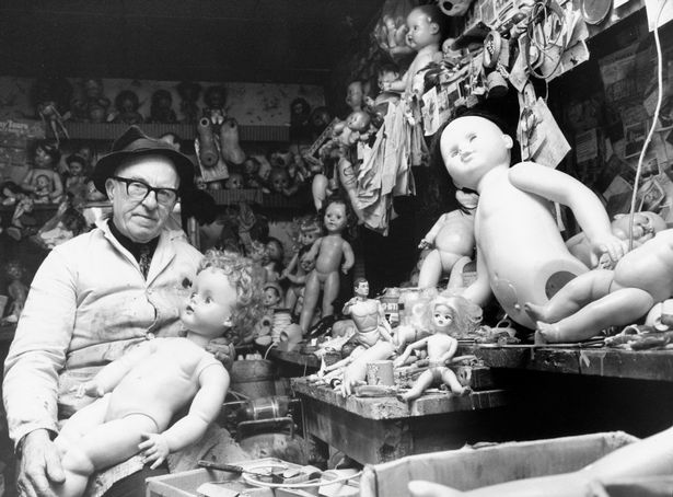 Doc Higgins, repairer of broken toys in his workshop - the Manchester Dolls' Hospital