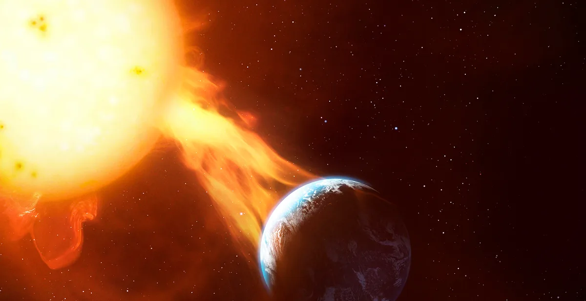 Illustration of a coronal mass ejection impacting the Earth's atmosphere. Credit: Mark Garlick / Science Photo Library / Getty Images