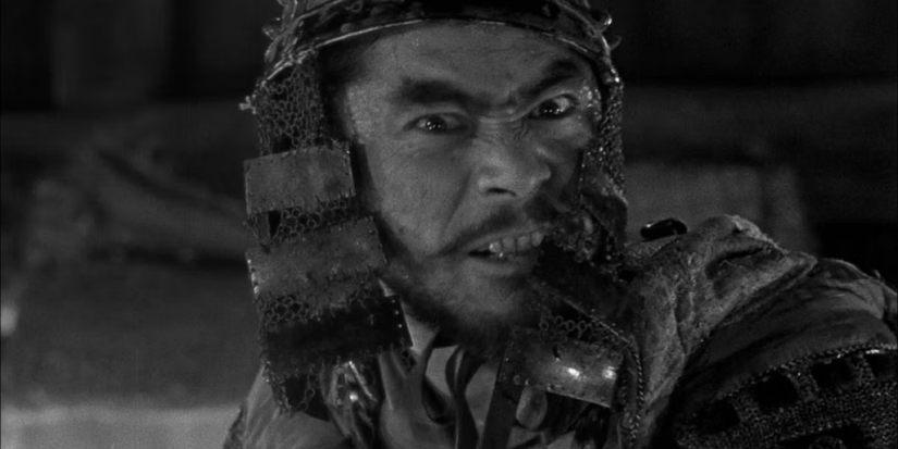 Kikuchiyo (Toshiro Mifune) looks aggressive in Seven Samurai.