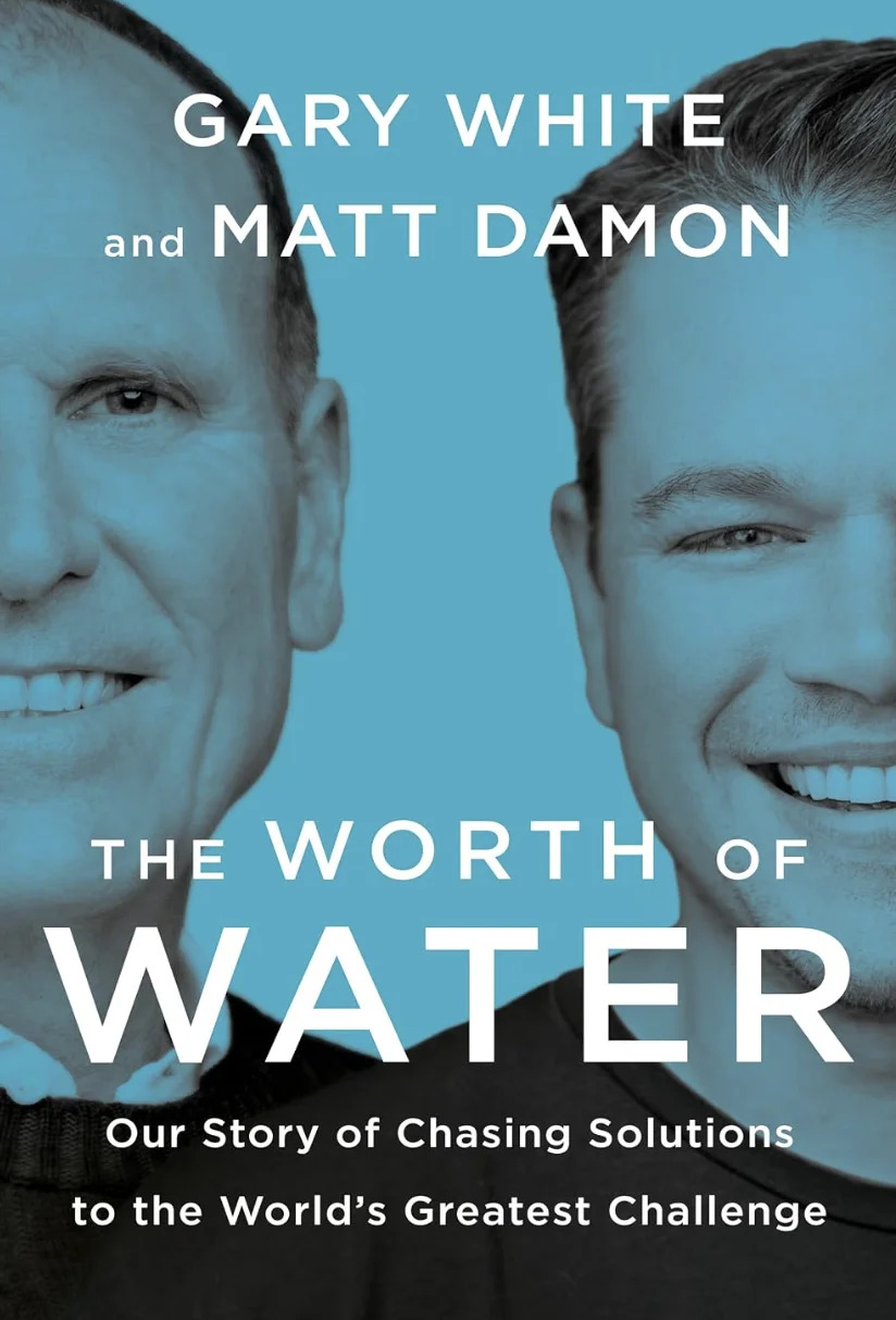 Book cover for "The Worth of Water" by Gary White and Matt Damon, featuring portraits of both authors on a blue background