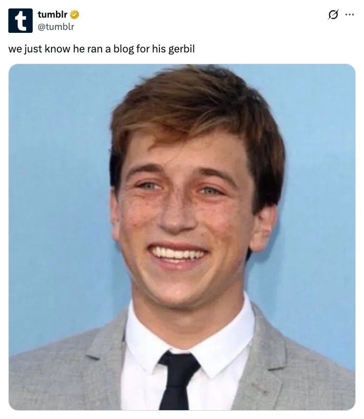 Smiling Skyler Gisondo in a suit and tie with text above: "we just know he ran a blog for his gerbil."