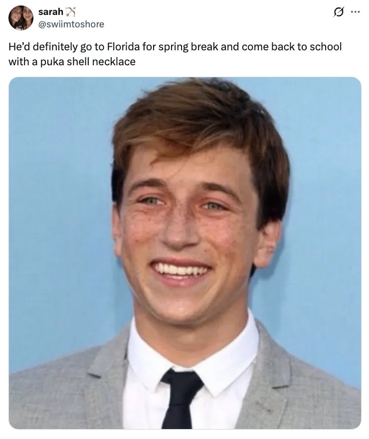 Skyler Gisondo smiling in a suit and tie, caption humorously suggesting they'd wear a puka shell necklace after spring break in Florida