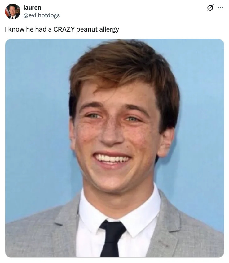 Skyler Gisondo in a suit and tie, with text above joking about a serious peanut allergy