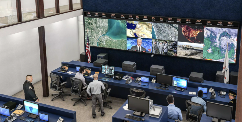 Tampa Defense Contractor Wins $12 Million in Federal Deals Personnel monitor communications systems and large digital displays inside a military command and control center.