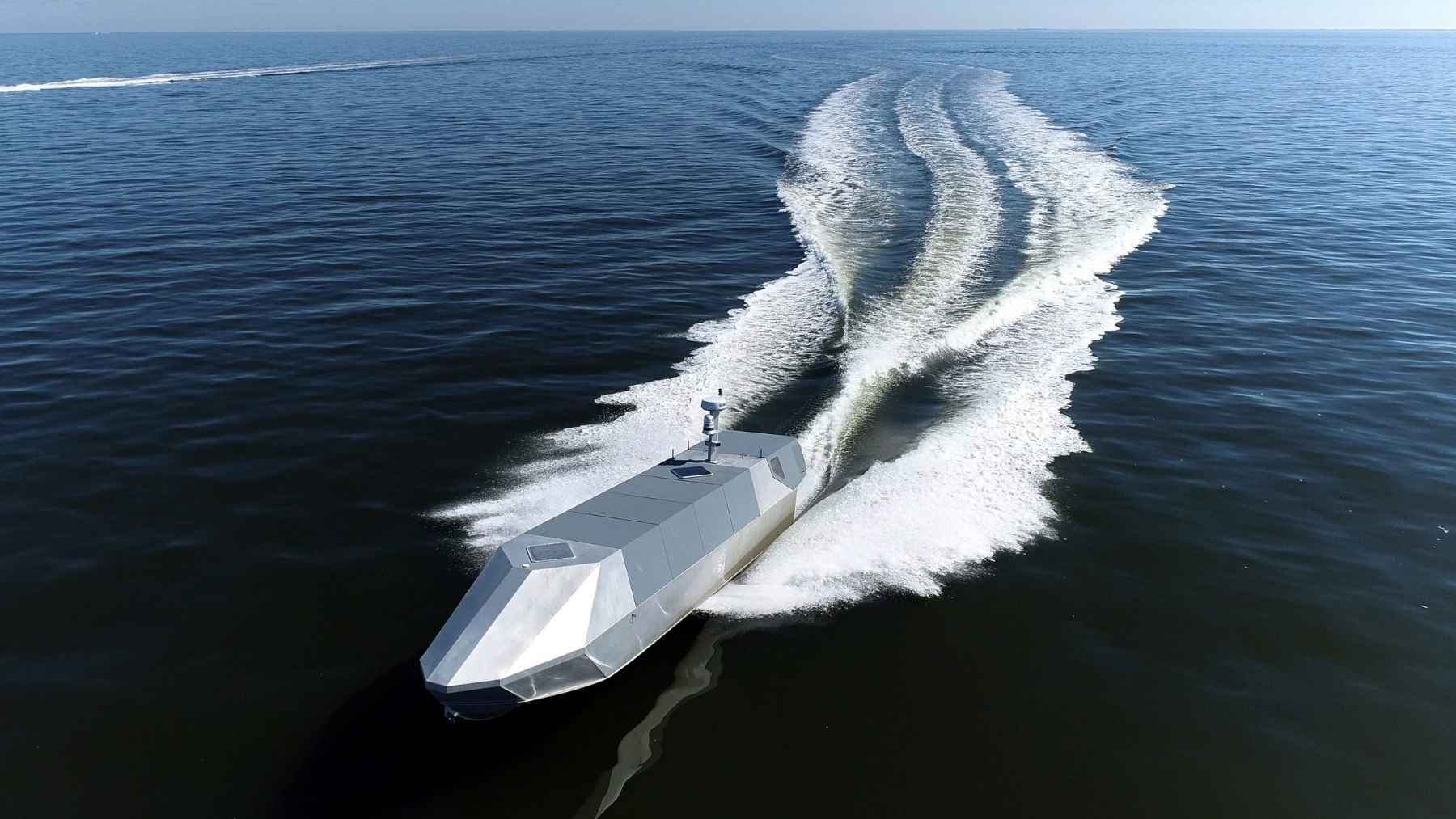 A 19,800-pound American drone boat spent two weeks running around A 19,800-pound American drone boat spent two weeks running around the clock in an Australian port and can watch one patch of ocean for 23 days on 790 gallons of diesel, from a hull 37 feet long that fits inside a 40-foot shipping container