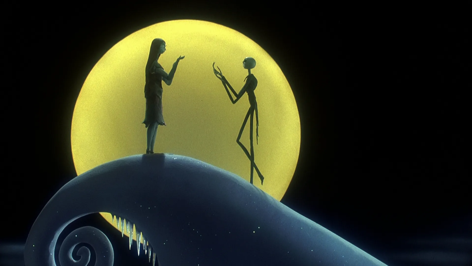 Jack Skellington and Sally under the moonlight in Tim Burton’s The Nightmare Before Christmas.