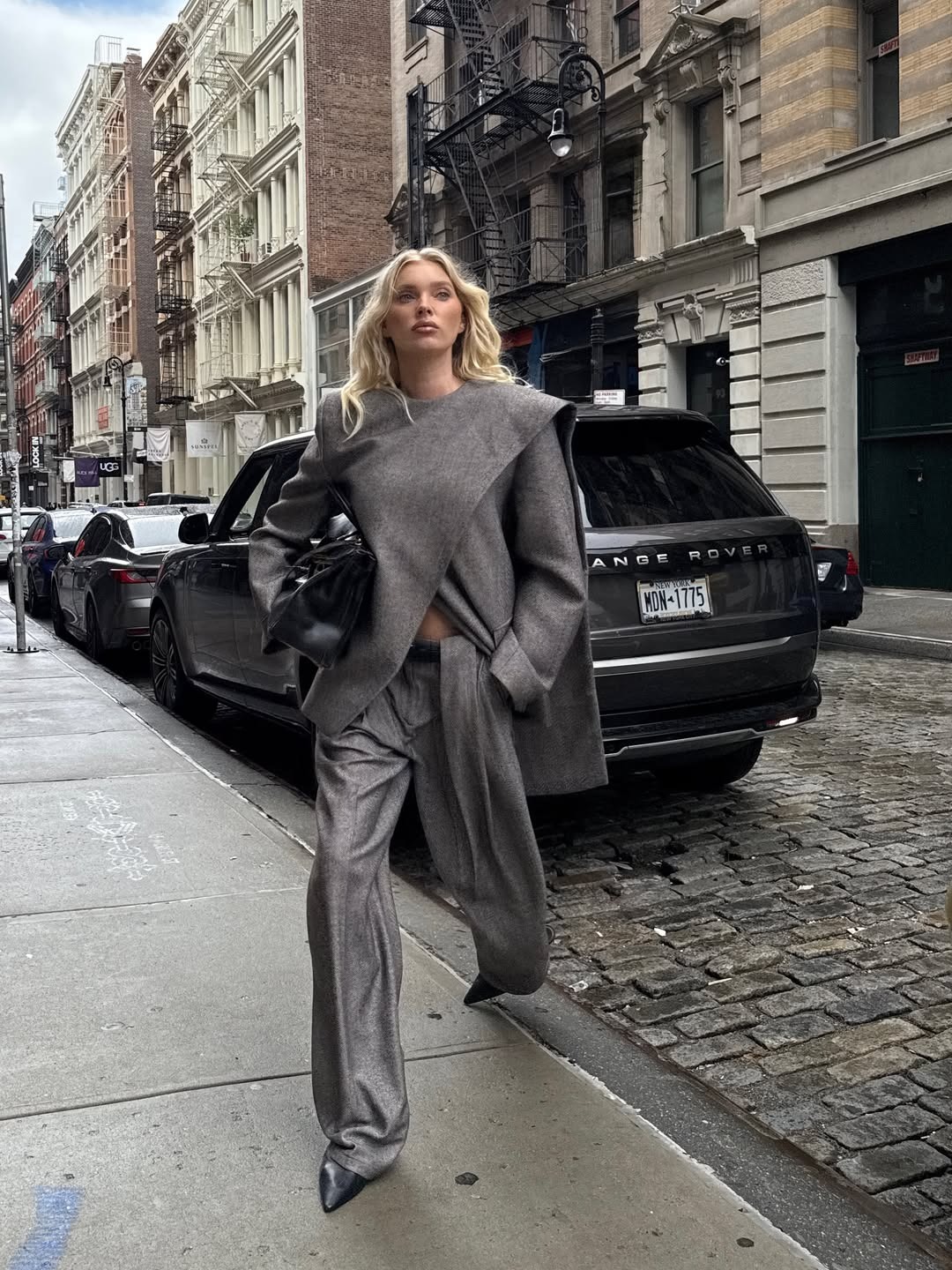 grey trouser trend 2026: Elsa Hosk