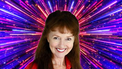 Headshot of Melanie Walters in front of branding for Strictly Come Dancing 2026 - a background of glittering pink, purple and gold beams of light.