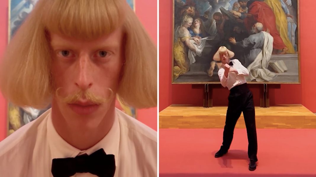 AI influencer Jean Philanthrope racked up tens of millions of views, then got a meme coin A person with a bowl haircut dances in front of a large painting in a museum.