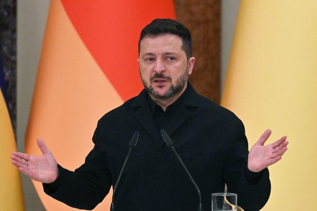 Ukraine's President Volodymyr Zelensky speaks during a press conference following talks with Germany's Chancellor in Mariinsky Palace following talks in Kyiv on October 4, 2026, amid the Russian invasion of Ukraine. (Photo by Sergei SUPINSKY / AFP via Getty Images)