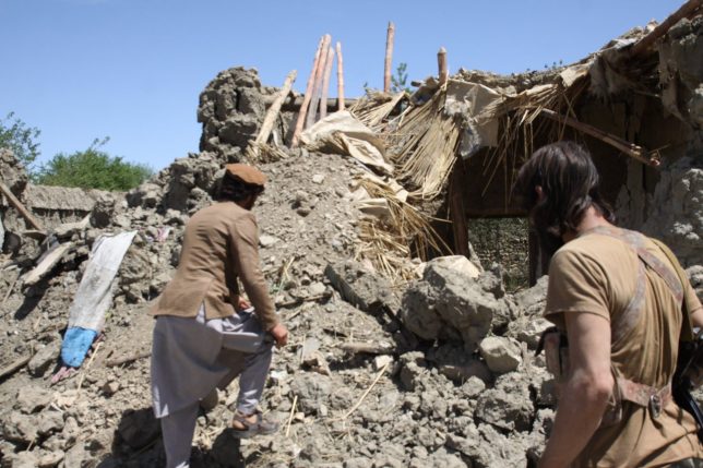 NANGARHAR, AFGHANISTAN - APRIL 15: Debris of a collapsed building is seen in the Acin district after The US military dropped America's most powerful non-nuclear bomb on Daesh targets in Nangarhar province of Afghanistan on April 16, 2017. A GBU-43/B Massive Ordnance Air Blast Bomb (MOAB), also known as the "mother of all bombs," was dropped on Thursday. (Photo by Zabihullah Ghazi/Anadolu Agency/Getty Images)