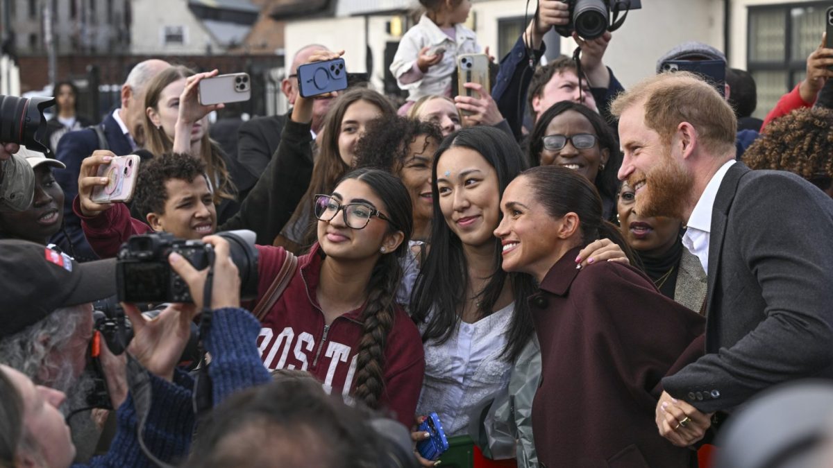 The pictures of Harry and Meghan that show what the The pictures of Harry and Meghan that show what the Royal Family is missing