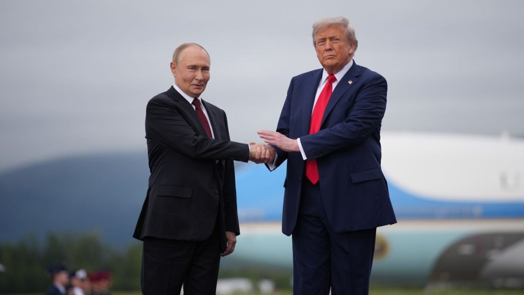 ANCHORAGE, ALASKA - AUGUST 15: U.S. President Donald Trump (R) greets Russian President Vladimir Putin as he arrives at Joint Base Elmendorf-Richardson on August 15, 2025 in Anchorage, Alaska. The two leaders are meeting for peace talks aimed at ending the war in Ukraine.  (Photo by Andrew Harnik/Getty Images)