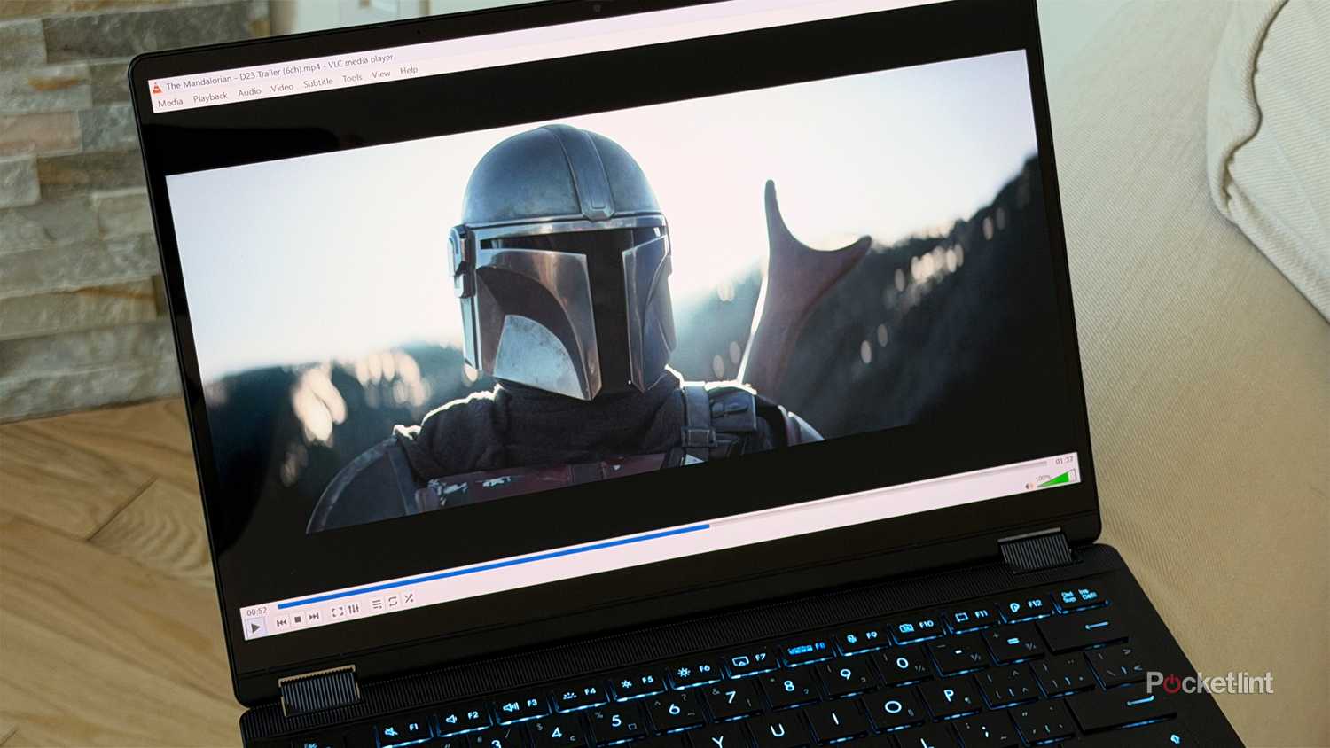 VLC media player on laptop.