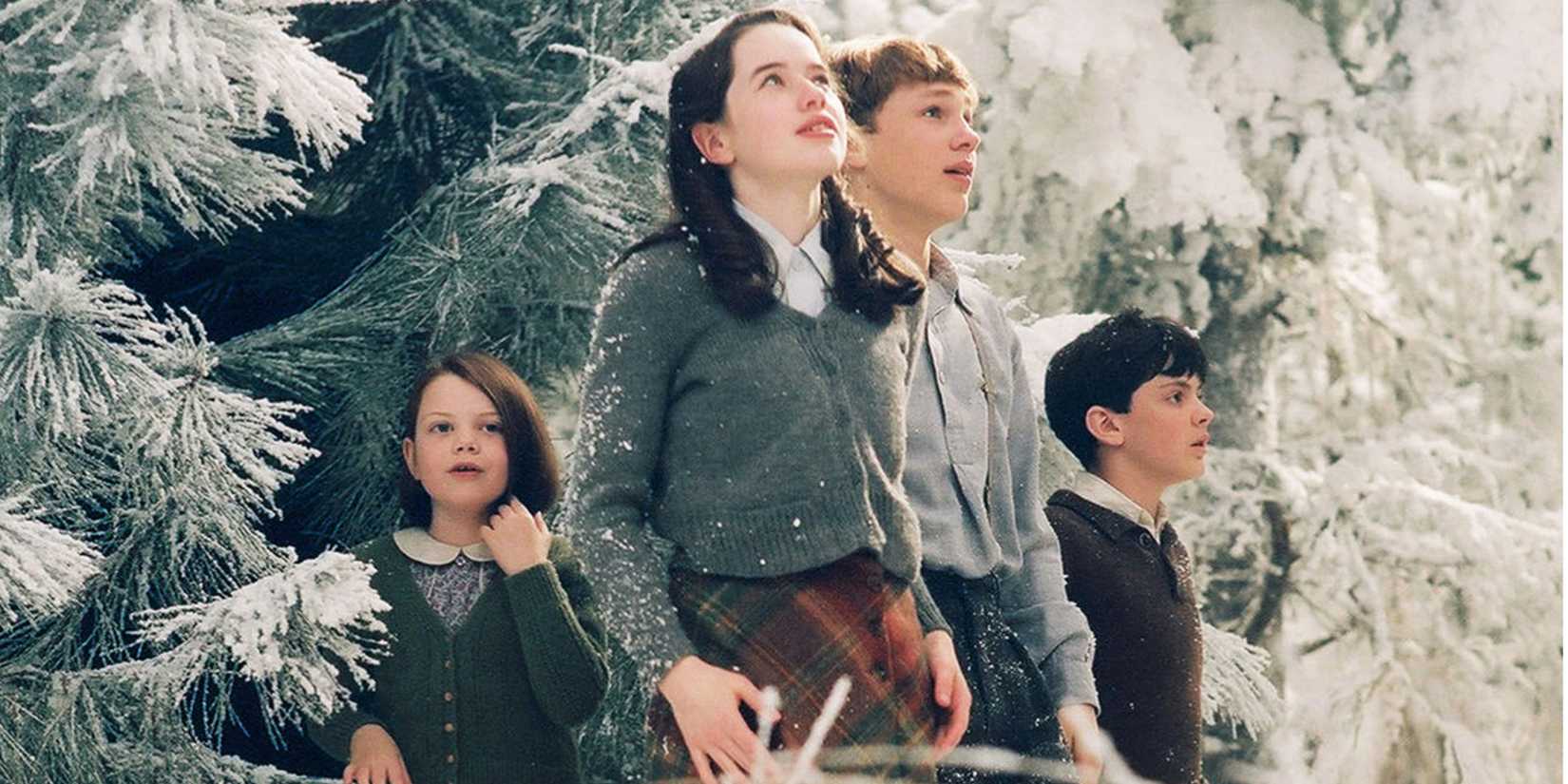 The Pevensie children enter the snow-covered woods of Narnia for the first time