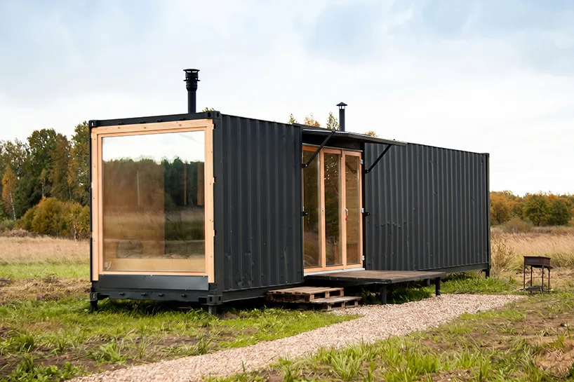 Innovative Birch Plywood Interior Transforms Shipping Container into Modern Micro-Cabin Steel shipping container converted into a 24-sqm micro-cabin.