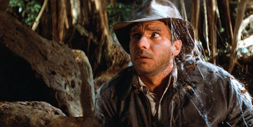 Harrison Ford as Indiana Jones covered in webbing from Raiders of the Lost Ark (1981)
