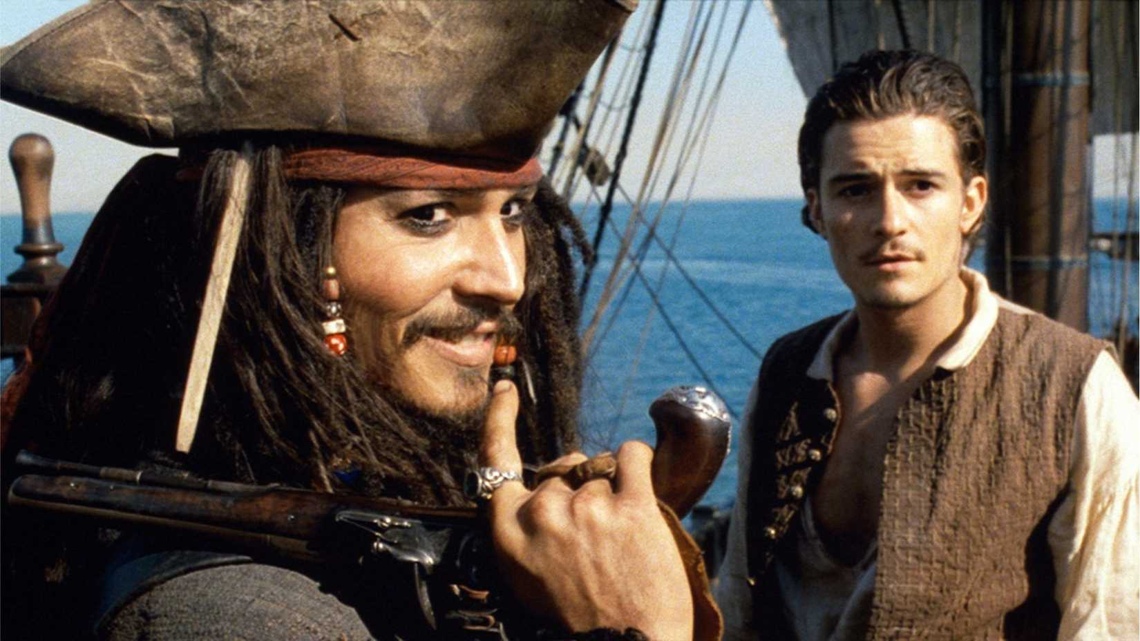 Johnny Depp and Orlando Bloom Star in Gore Verbinski's Swashbuckling Blockbuster, Pirates of the Caribbean: The Curse of the Black Pearl