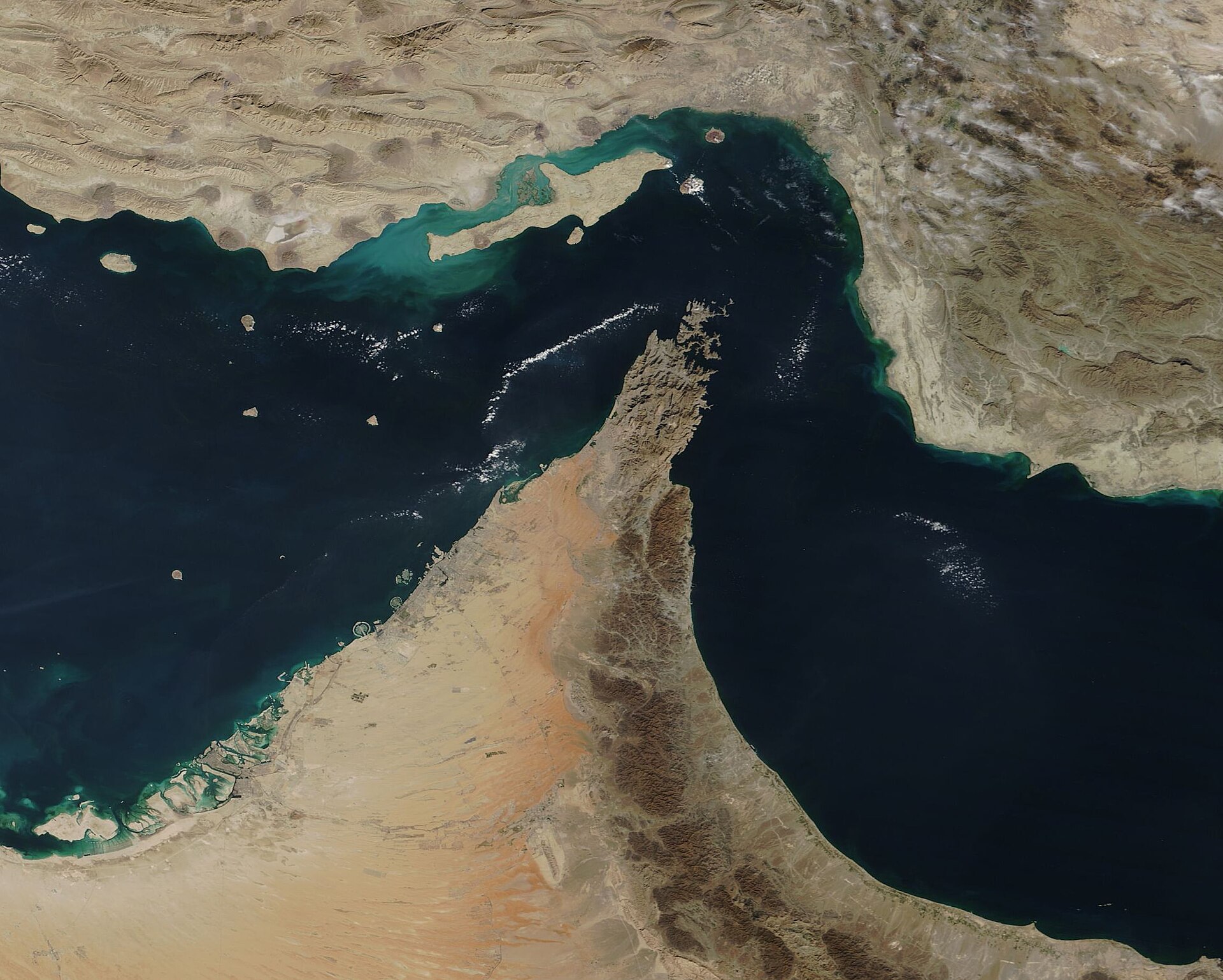 NASA MODIS satellite view of the Strait of Hormuz and Musandam Peninsula showing the chokepoint between Iran and the Arabian Peninsula
