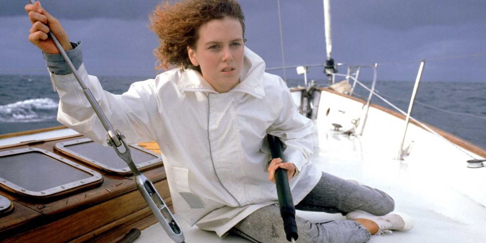 Nicole Kidman drives a sailboat and holds a speargun in Dead Calm