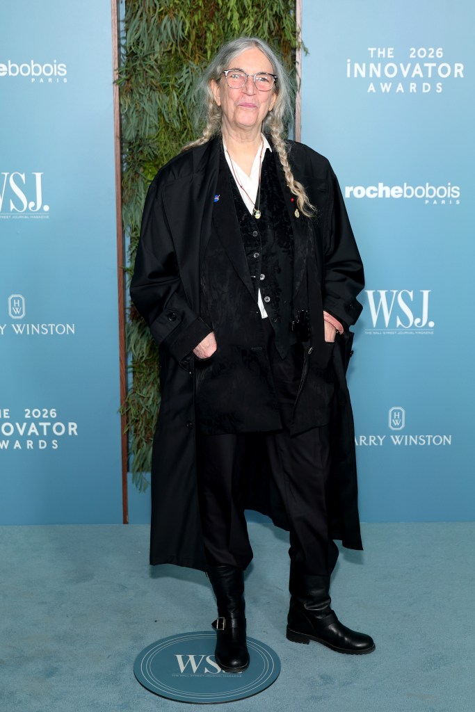 Patti Smith posing on the red carpet at the WSJ. Magazine Innovator Awards.