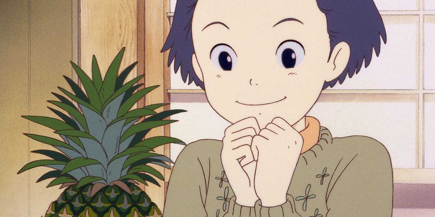 Taeko smiles at a pineapple in Only Yesterday.