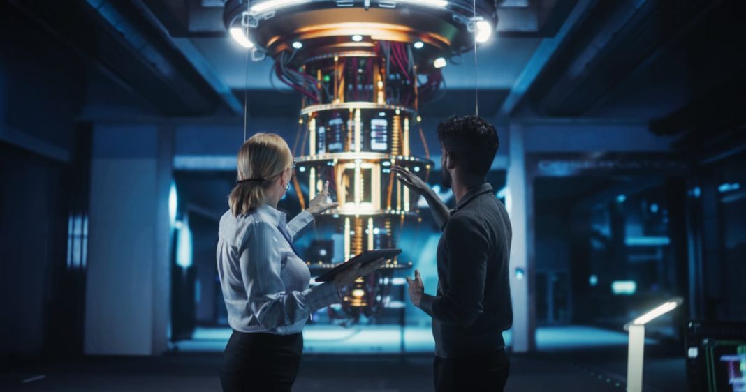 This Brilliant Quantum Computing Stock Could Double in a Year Two engineers working on a quantum computer.