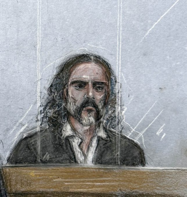 Court artist sketch by Elizabeth Cook of Russell Brand appearing in the dock during jury selection??at Southwark Crown Court, London, where he faces three charges of rape, indecent assault, and three counts of sexual assault, relating to six women. Picture date: Monday October 12, 2026. PA Photo. Photo credit should read: Elizabeth Cook/the Press Association